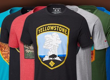 Colorful variety of t-shirts showcasing different U.S. national parks. 