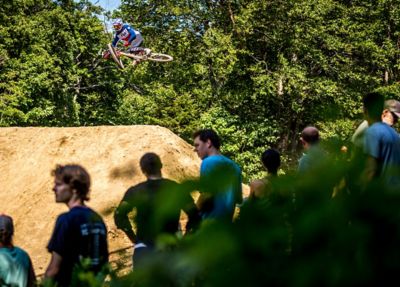 Mountain biker jumping his bike at the Fox US Open of Mountain Bike