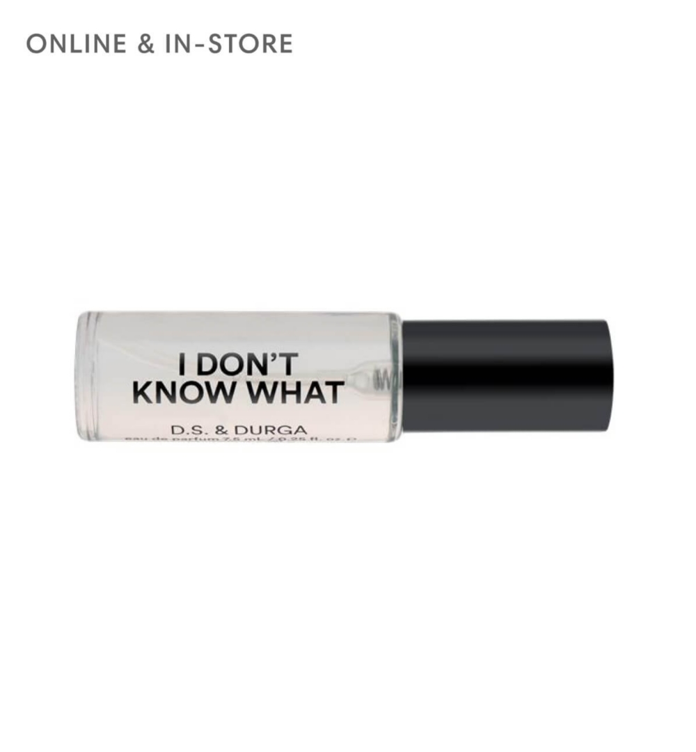 Three fragrance bottles shaped like the torsos of men and women