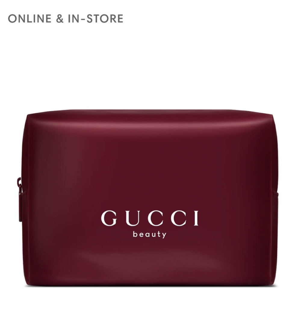 Two mini fragrances next to a bright yellow box