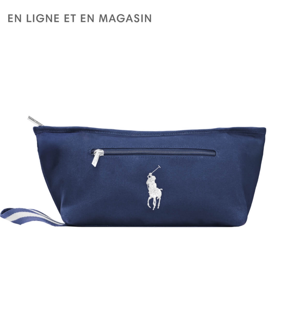 Une boîte brune à côté d'un flacon de parfum transparent