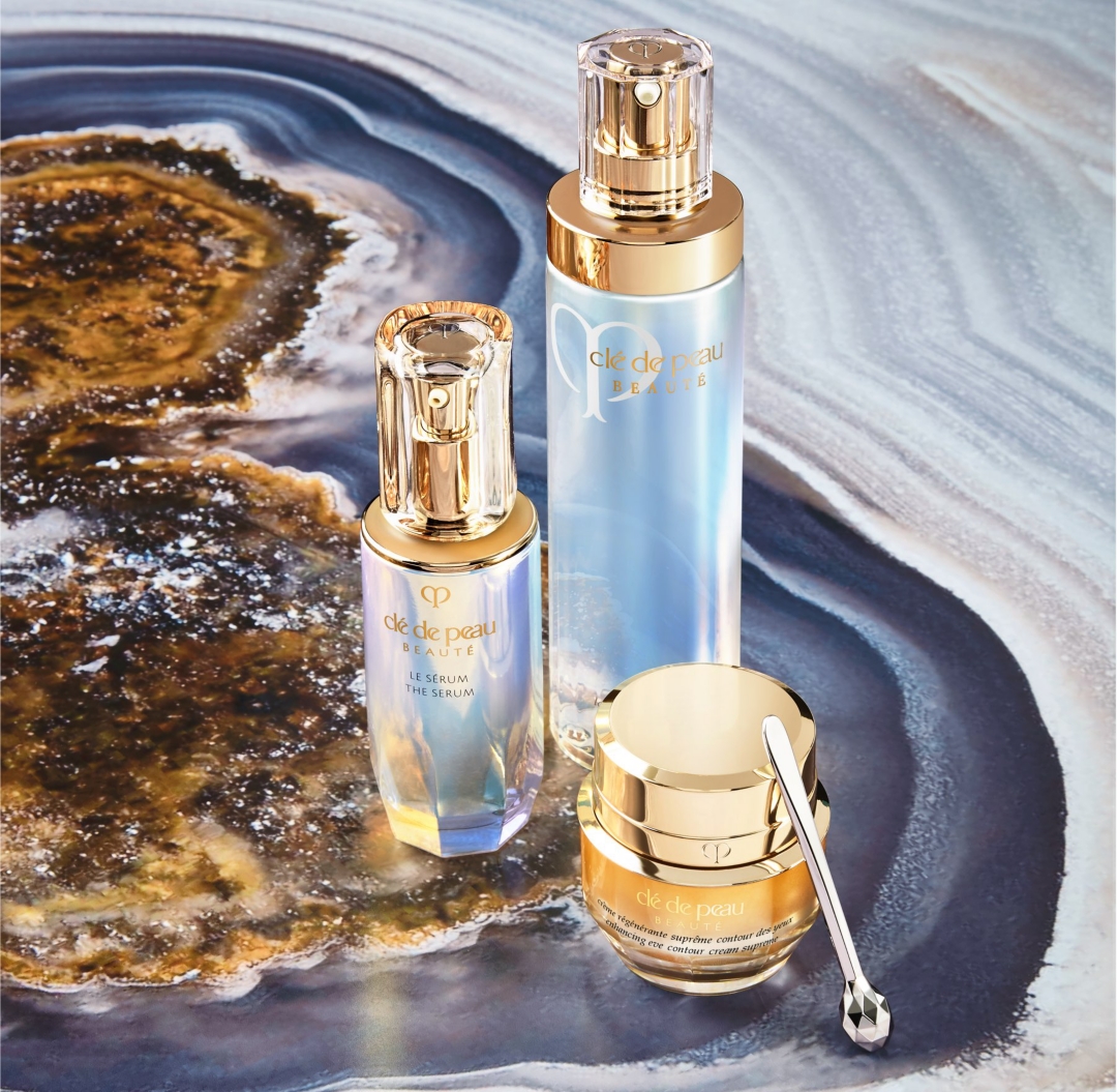 Clé de Peau Beauté. The Serum. Hydro-Clarifying Lotion. Enhancing Eye Contour Cream Supreme.