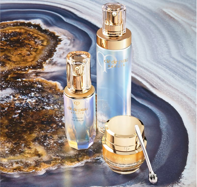 Clé de Peau Beauté. The Serum. Hydro-Clarifying Lotion. Enhancing Eye Contour Cream Supreme.