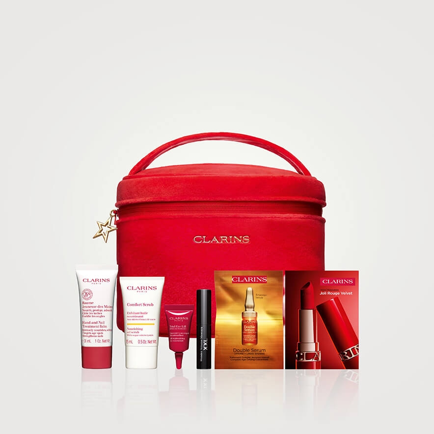 A red bag with a number of Clarins beauty products