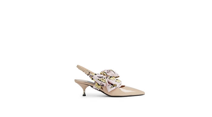 Holt Renfrew image of PRADA Patent Leather Slingback Pumps With Bow. $965. SHOP NOW