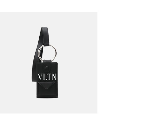 Holt Renfrew Image of VALENTINO. VLTN Logo neck wallet. $900. FIND YOUR STORE