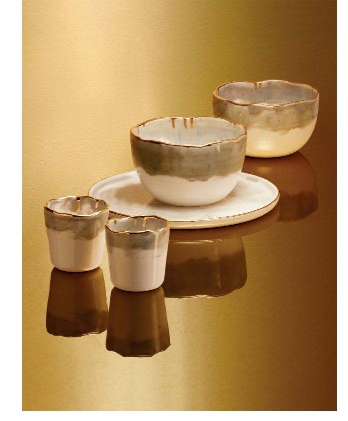 Holt Renfrew image of DOMPIERRE. Gold Collection ceramic dishes handmade from recycled Canadian clay. Goblet. $25 each. Bowl. $35 each. Plate. $32. SHOP DOMPIERRE