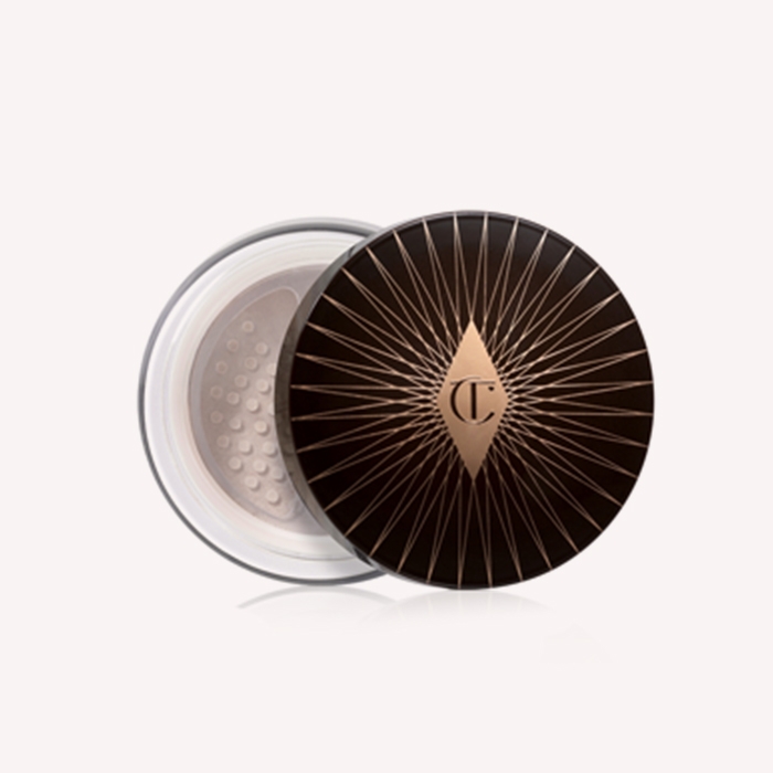 Holt Renfrew image of CHARLOTTE TILBURY. Charlotte's Genius Magic Powder. $58. SHOP NOW