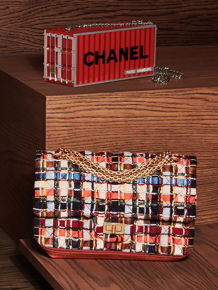 Holt Renfrew Image of CHANEL resin, metal, and leather minaudière. Tweed flapbag in blue, orange, navy, and beige. Prices available upon request.
