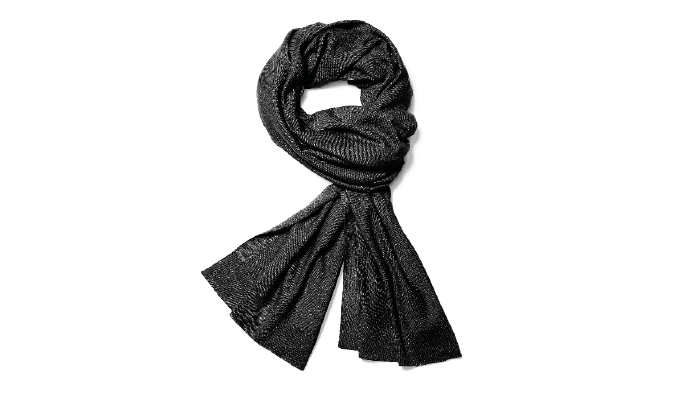 Holt Renfrew image of NAADAM. Chetwyn travel wrap made from ethically sourced Mongolian cashmere. $145. SHOP NAADAM
