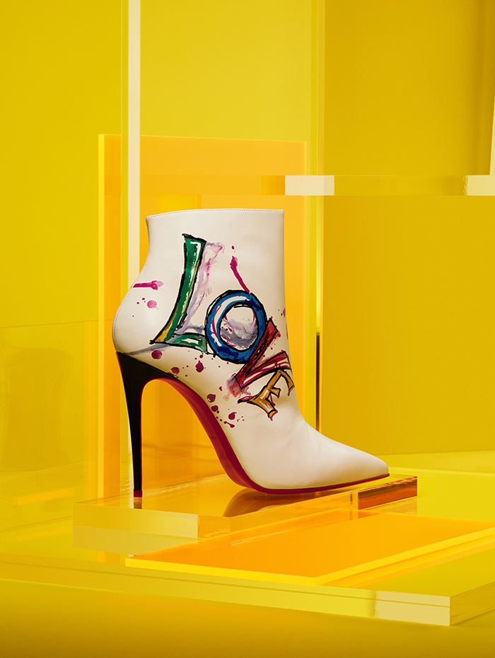 Holt Renfrew image of Christian Louboutin Calf leather 100 mm Boot In Love ankle boot in white. $1745.
