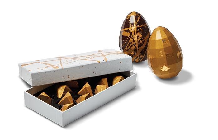 Holt Renfrew image de CXBO Gold edition chocolate pyramids. $56. Ornament eggs. $28.