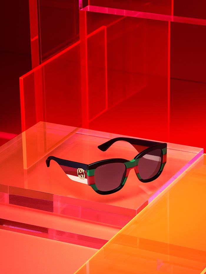 Holt Renfrew image of Gucci Oversized sunglasses with Web tones on front and Sylvie tones on temples. $525.