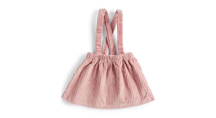Holt Renfrew image of DOG & DAISY. Ethically-made baby corduroy suspender skirt. $60. SHOP DOG & DAISY