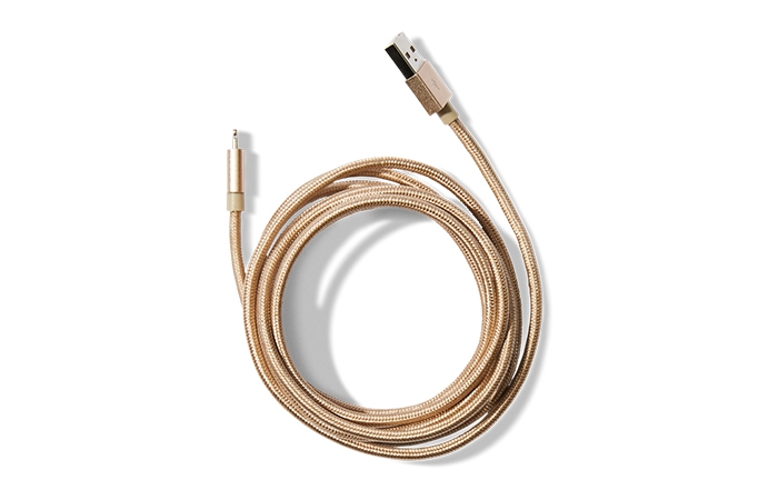 Holt Renfrew image of LE CORD Braided cord in gold. $65. 