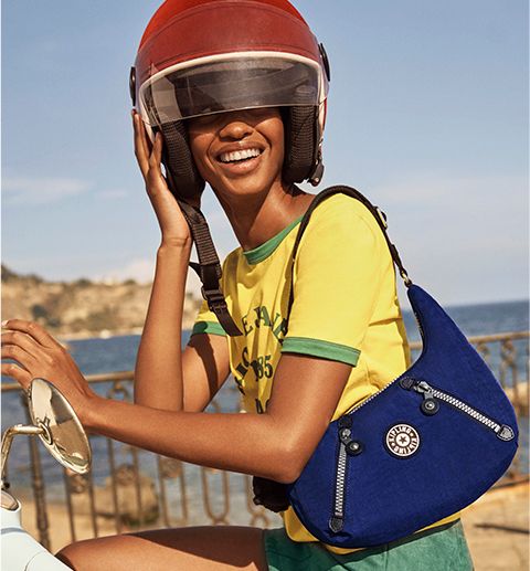 Kipling Live.Light A colorful array of handbags backpacks