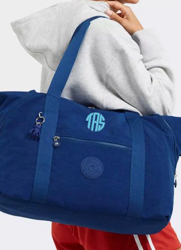 Kipling Pouch Bag at best price in Delhi by Iris Bags And