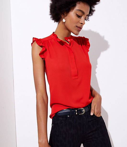 Ruffles are the sweetest treat for this streamlined henley shell. Round neck. Sleeveless. Henley button placket. Shirred beneath shoulders and back yoke. Shirttail hem.