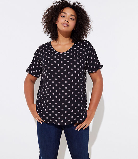 Spliced with a fluid woven front - and soft knit back - this tee has just the right amount of modern-cool allure. Round neck. Short dolman sleeves. Hi-lo shirttail hem.