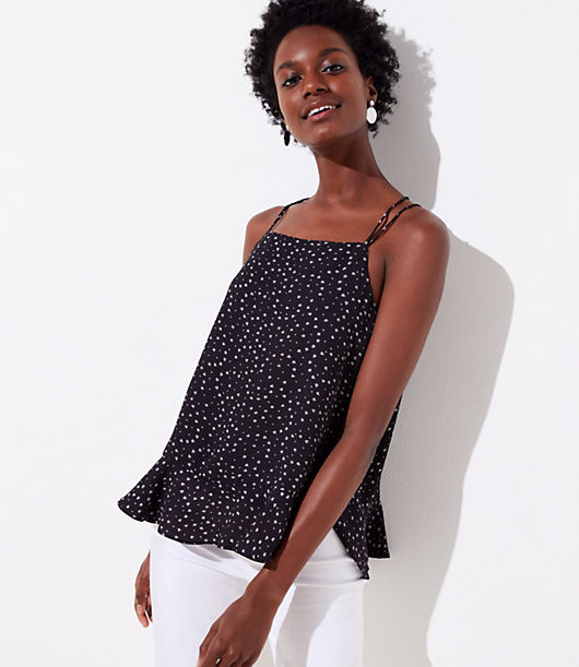Blossomed in delicate florals and a flounce hem, we're into the clean lines of this strappy essential. V-neck. Double spaghetti straps go into criss cross back. Slight racerback. Shirttail hem. Lined.