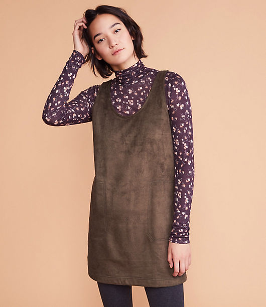 From the luxe suede-inspired finish to the modern styling, we're into the irresistibly cool attitude of this must-have dress. Scoop neck. Sleeveless. Welt patch pockets. 33inch from shoulder to hem, measured from a size S.