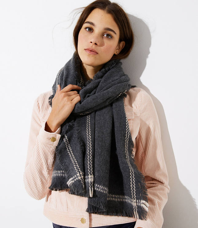 In a chic shade with a stitched border, this soft scarf is an effortlessly stylish partner to any outfit. 24inch x 78 1/2.inch
