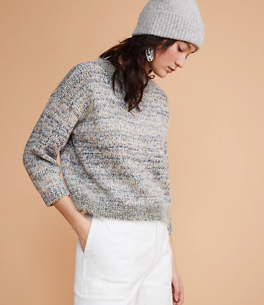 Edged with eyelash trim, a fresh burst of season-perfect hues gives this knit some seriously cozy appeal. Round neck. 3/4 sleeves.