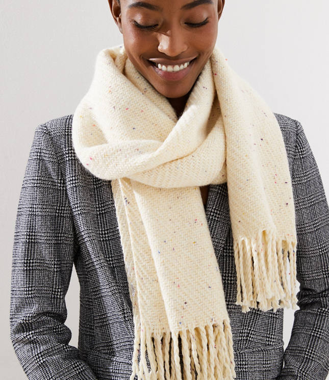 Understated with a hint of confetti-inspired stitching, this chunky scarf is a love-forever dose of warmth for layered looks. 17inch x 72.inch