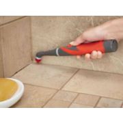hand held power scrubber in use image number 7