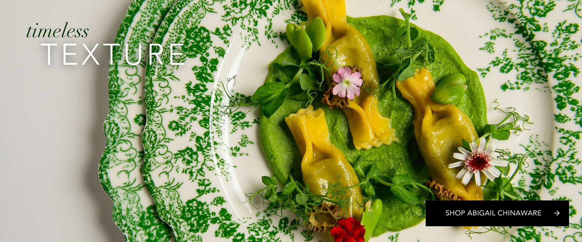 Luxury event table setting featuring patterned Abigail chinaware for high-end wedding and corporate gala rental