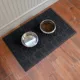 Product Bungalow Flooring WaterHog Dog Paw & Squares Dog Bowl Placemat, 35 x 23-in