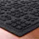 Product Bungalow Flooring WaterHog Dog Paw & Squares Dog Bowl Placemat, 35 x 23-in