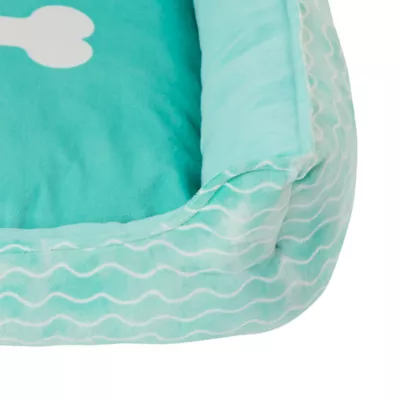 Product Top Paw® Wave & Bone Cuddler Dog Bed