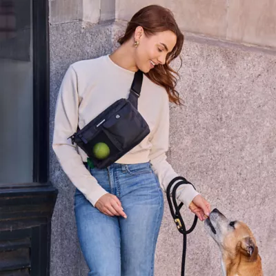 Cleverpup Dog Walk & Train Sling Bag W/ Poop Bag Dispenser, Treat Pocket, and Hidden Squeaker - Image 2
