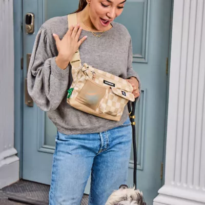 Cleverpup Dog Walk & Train Sling Bag W/ Poop Bag Dispenser, Treat Pocket, and Hidden Squeaker - Image 2