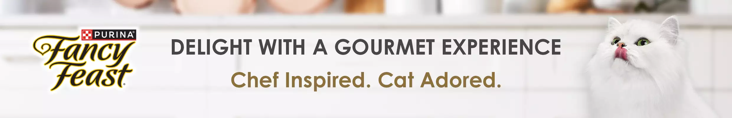 Delight with a gourmet experience.  Chef Inspired.  Cat Adored.  Purina Fancy Feast logo with picture of a white cat licking it's mouth.