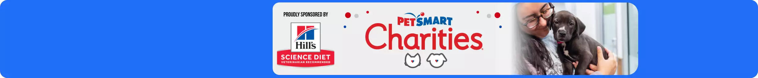 Hill's Pet Nutrition logo on the left, Petsmart Charities logo in the middle, and a woman holding a brown puppy on the right.