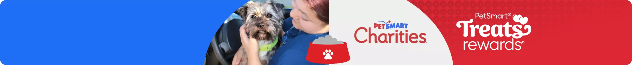 Woman with blue shirt, sitting in her car and holding a dog. PetSmart Charities and Treats logos.