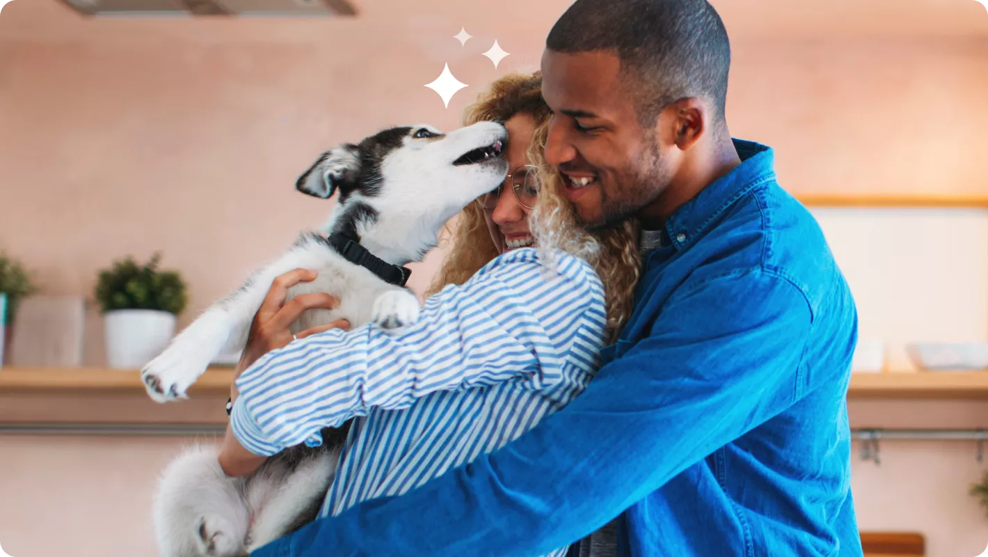 girl hugging dog
