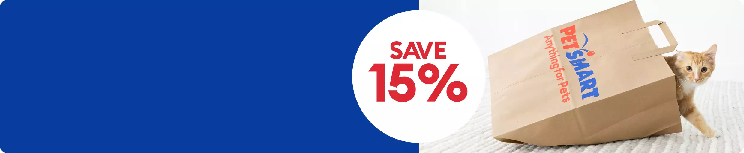 Save 15% callout and a cat walking out of a PetSmart shopping bag
