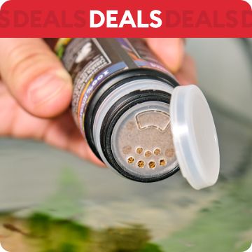 Hand holding fish flakes; text that says deals