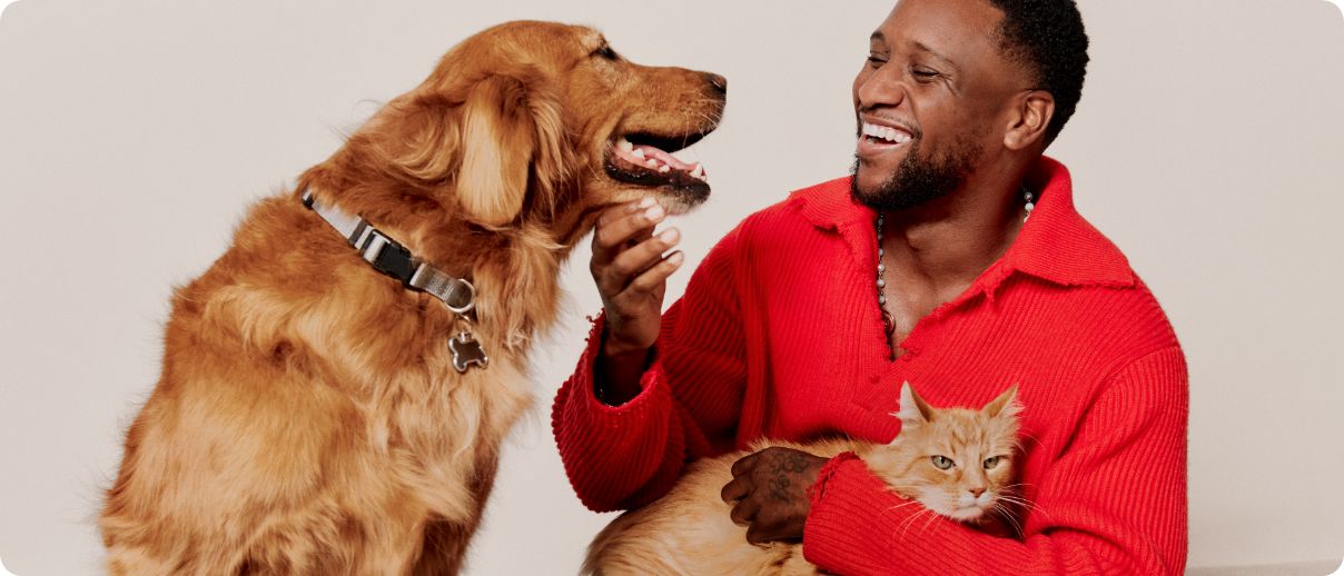 Man with dog and cat