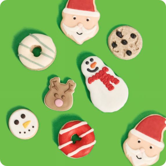 Bakery style holiday treats on green background