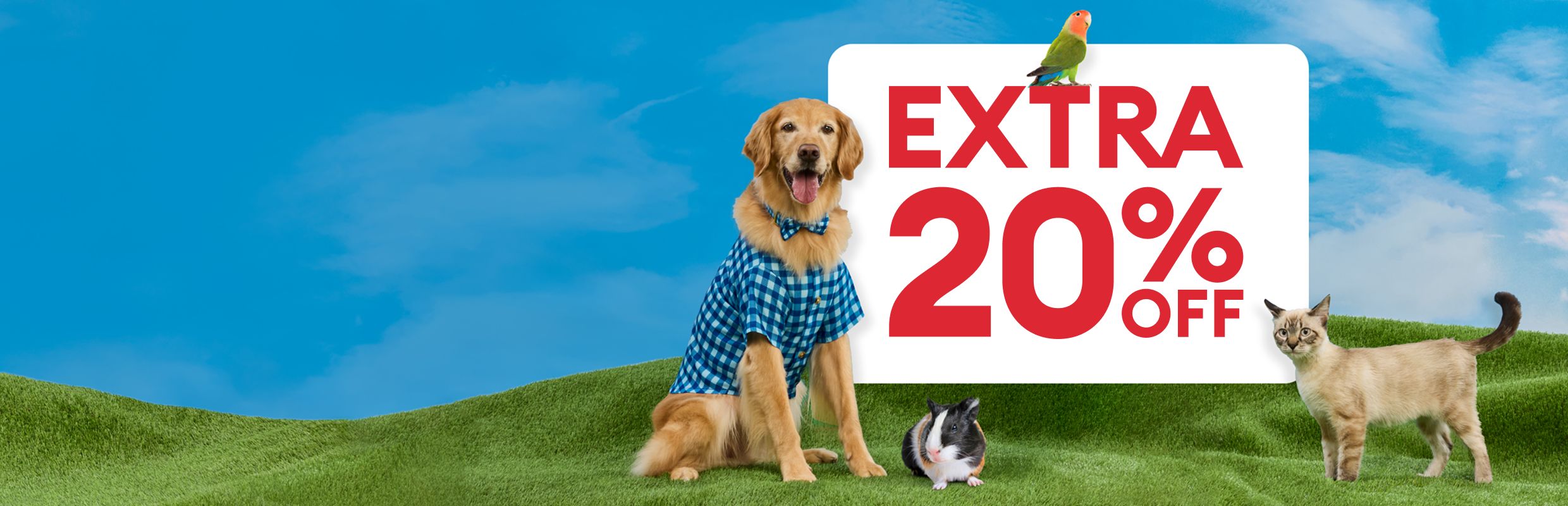Golden retriever in a blue shirt with a rabbit, parrot & cat on grass beside an Extra 20% Off callout