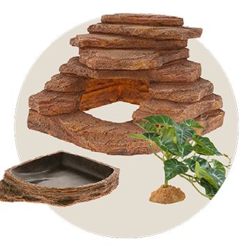 Stacked rock hide with reptile bedding substrate