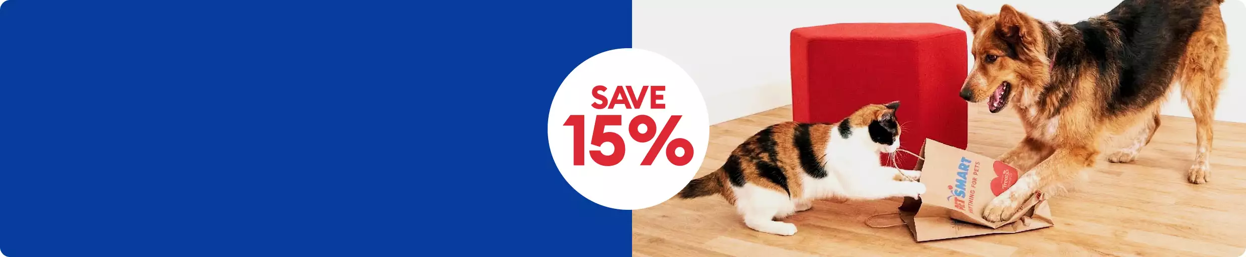 Save 15% message and a dog & cat playing with a PetSmart shopping bag