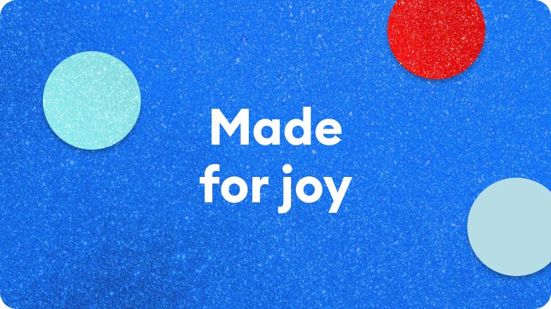 Text that reads, Made for joy quality, on a blue background with red & blue dots