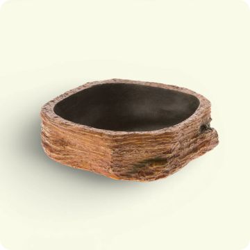A food bowl that looks like a piece of wood