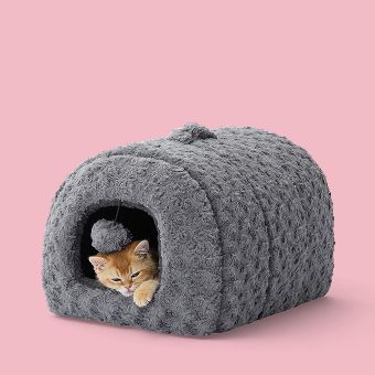 Cat lying in a Whisker City Fur Hideaway Bed