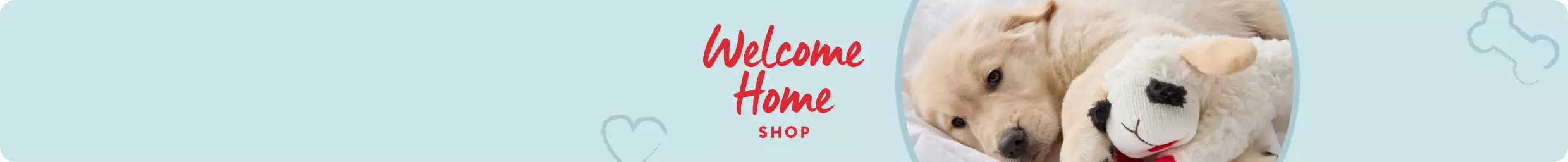 Welcome Home shop in red on light blue shown with small golden puppy & plush Lamb Chop toy